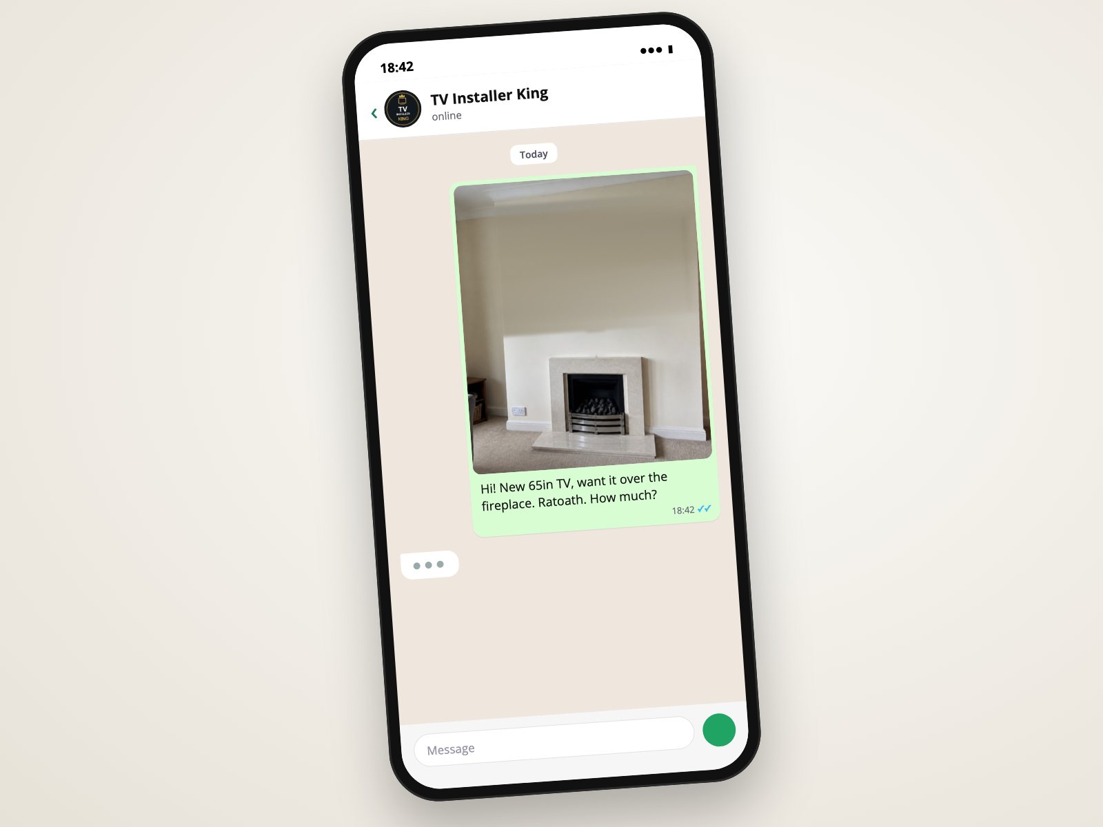 A phone showing a wall photo sent to TV Installer King