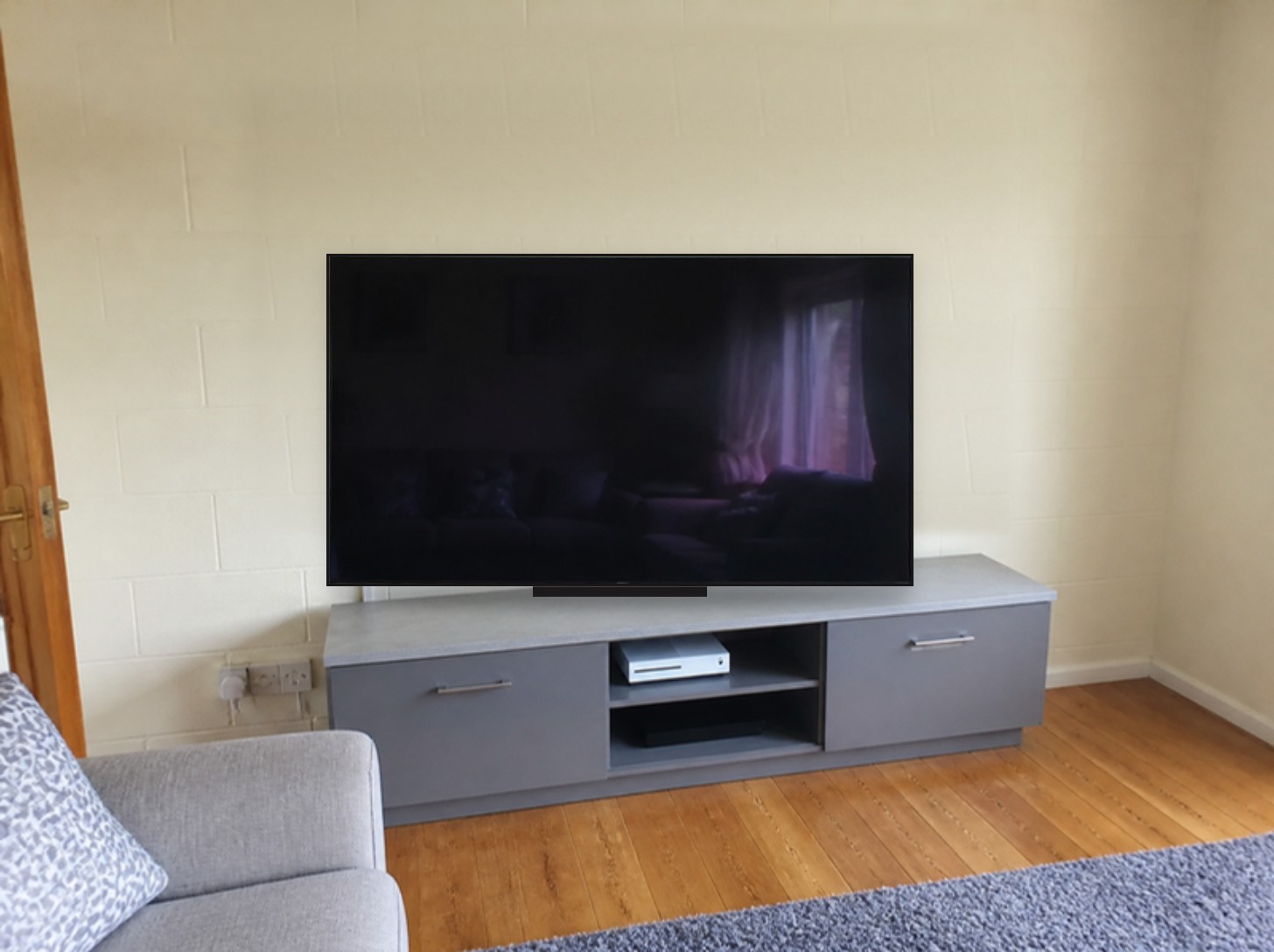 Before: 75in · block wall · full motion